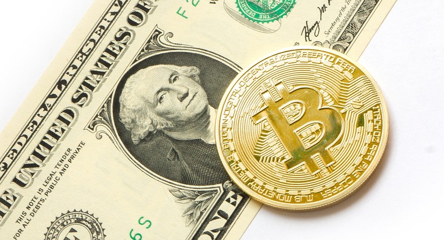 比特幣與實體貨幣間的兌換模式仍相當不穩定。(photo by tombark via Pixabay, used under CC License)